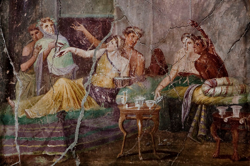 Roman fresco with banquet scene inside the House of Chaste Lovers in Pompeii